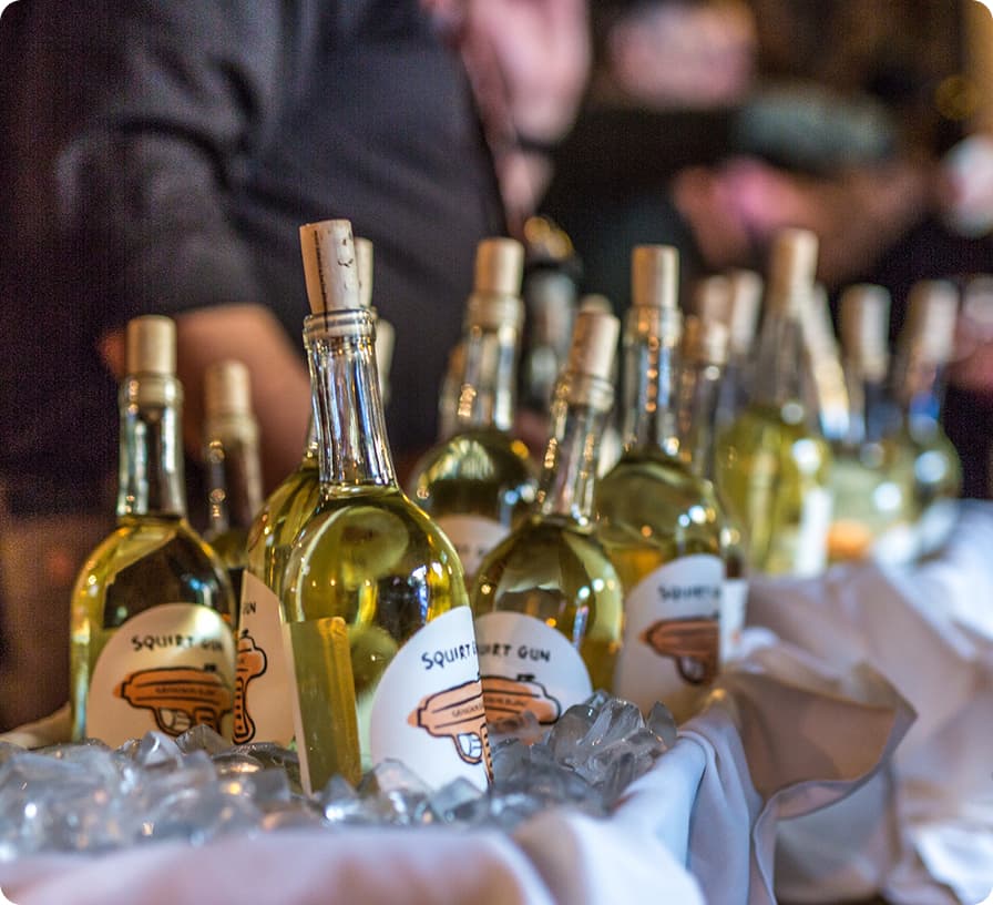 Bottles of wine on ice at a VIP event